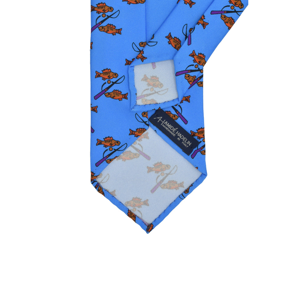 Amidé Hadelin | Handprinted silk fishes tie untipped, light blue_back